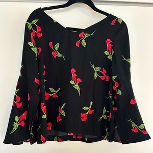 Black and pink floral blouse with bell sleeves